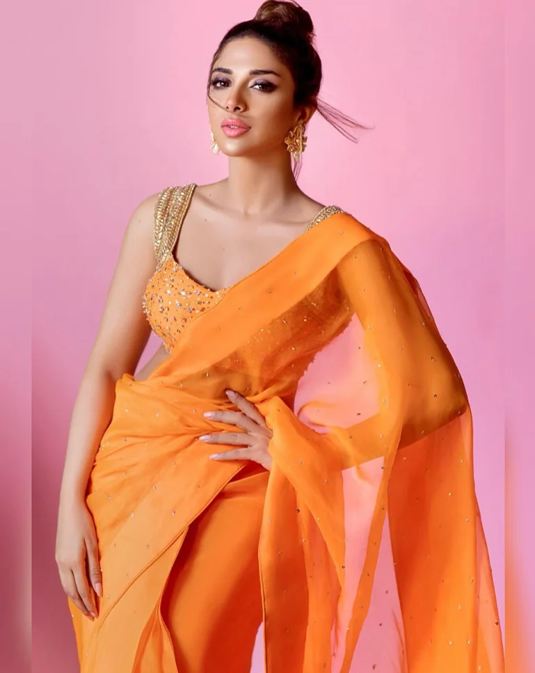 Tich button promotion orange saree by sonya hussyn
